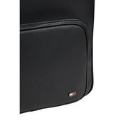 Tommy Hilfiger Sac à dos en cuir noir pour homme TH Foundation, avec poche latérale en cuir perforé et fermeture éclair cousue. Vue détaillée