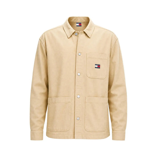 Veste de travail beige Tommy Hilfiger pour homme en coton biologique, col boutonné et deux grandes poches plaquées.