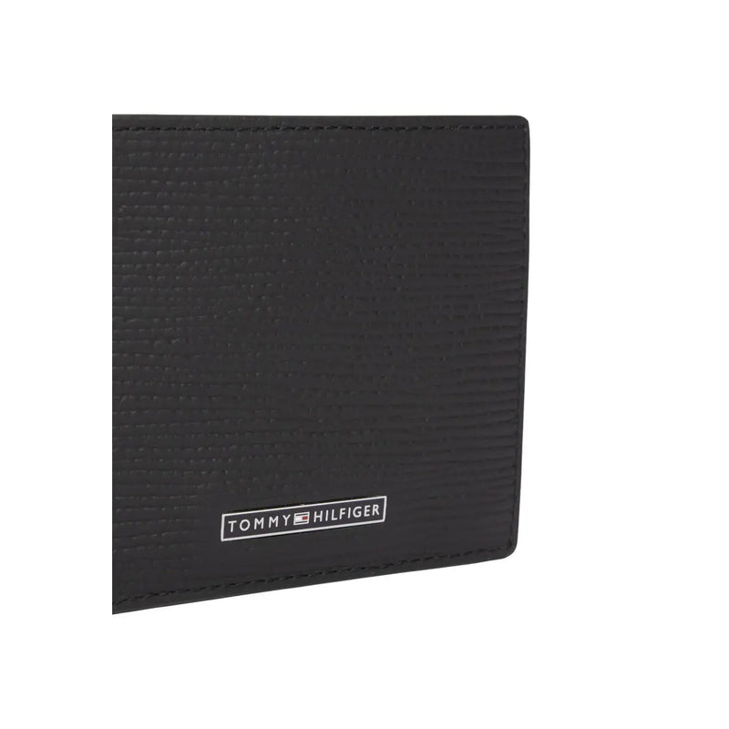 Tommy Hilfiger men black leather business wallet with textured finish and subtle embossed logo at the bottom