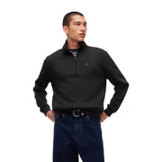 Pull Tommy Hilfiger noir en coton biologique à col zippé et logo discret sur la poitrine pour homme