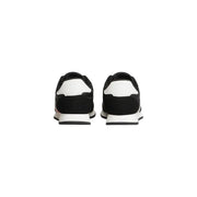 Tommy Hilfiger Baskets noires pour homme en polyester, au design moderne et élégant, ornées d'empiècements contrastés et de touches de rose.