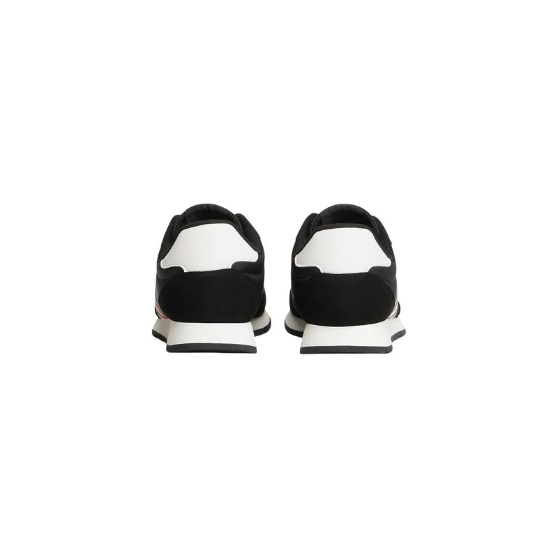 Tommy Hilfiger Baskets noires pour homme en polyester, au design moderne et élégant, ornées d'empiècements contrastés et de touches de rose.