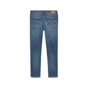 Tommy Hilfiger Jean slim en coton stretch bleu pour homme, avec étiquette de marque en cuir marron et détails de surpiqûres discrets.