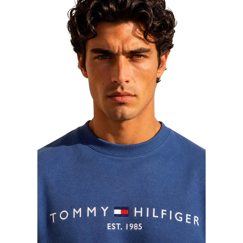 Tommy Hilfiger Sweat-shirt bleu en coton pour homme avec logo blanc et détail est sur le devant, idéal pour une tenue décontractée.