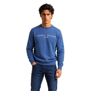 Tommy Hilfiger Sweat-shirt bleu en coton pour homme, orné d'un logo blanc et d'un drapeau sur la poitrine.