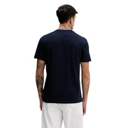 Tommy Hilfiger T-shirt homme bleu en coton bio, col rond, manches courtes et coutures latérales discrètes.
