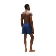 Short de bain bleu marine en polyester avec petit logo à la taille et cordon de serrage par Tommy Hilfiger pour hommes taille moyenne