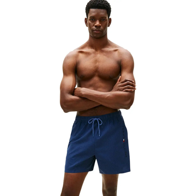 Tommy Hilfiger men blue polyester swim trunks with navy textured fabric light blue drawstring and side logo detail