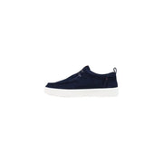 Tommy Hilfiger Mocassins en daim bleu marine pour hommes, baskets à enfiler bleu marine avec semelle en caoutchouc blanc, vue de face