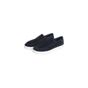 Tommy Hilfiger Mocassins pour homme en daim bleu marine, semelles en caoutchouc blanc et tige en daim bleu marine.
