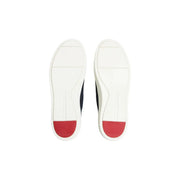 Mocassins Tommy Hilfiger pour homme en daim bleu, à enfiler, avec semelles en caoutchouc blanc et rouge et design minimaliste sur baskets noires