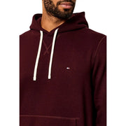 Tommy Hilfiger Sweat à capuche bordeaux pour homme en mélange de coton, avec cordons de serrage blancs et petit logo sur la poitrine, idéal pour une tenue décontractée.