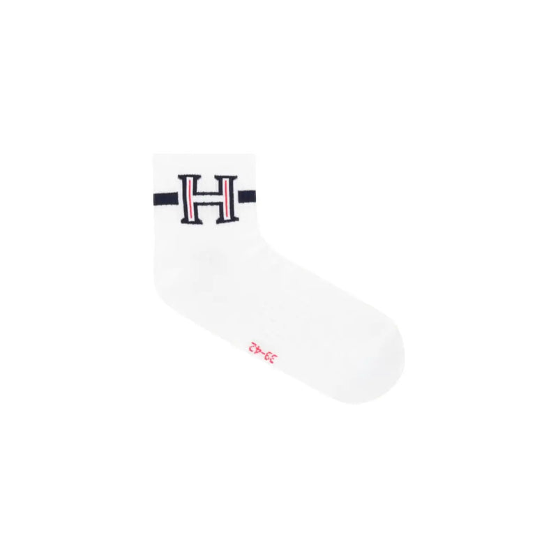 White ankle sock with bold embroidered h logo and navy red stripes in signature tommy hilfiger style cotton blend