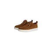 Tommy Hilfiger Mocassins pour homme en daim marron avec semelles en caoutchouc blanc et lacets marron assortis.