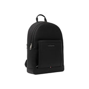 Sac à dos Tommy Hilfiger pour homme, modèle Central, en cuir texturé noir, avec poche avant zippée et finitions argentées.