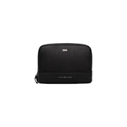cuir noir texturé Tommy Hilfiger Trousse de toilette pour homme avec poche centrale, design rectangulaire élégant et logo discret sur le devant