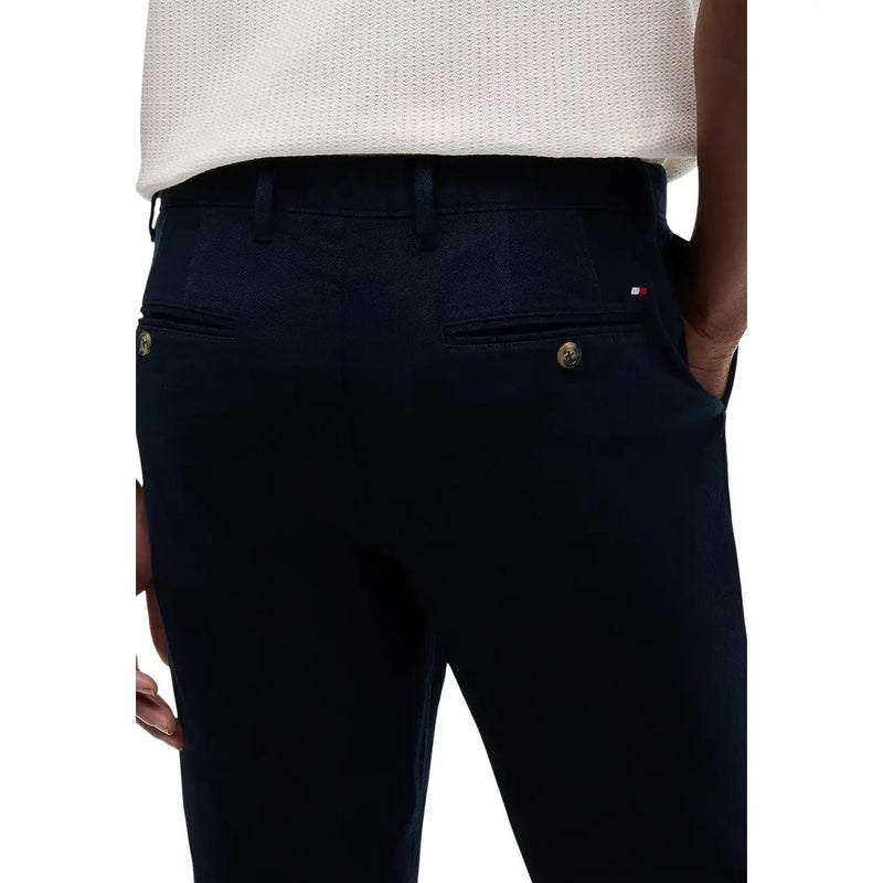 bleu marine Tommy Hilfiger Pantalon en coton pour homme, coupe Denton, avec boutons dorés et tissage texturé subtil.