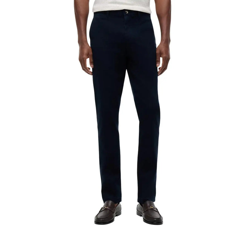 Tommy Hilfiger Pantalon en coton pour homme, bleu marine foncé, coupe droite élégante et détails de couture discrets.