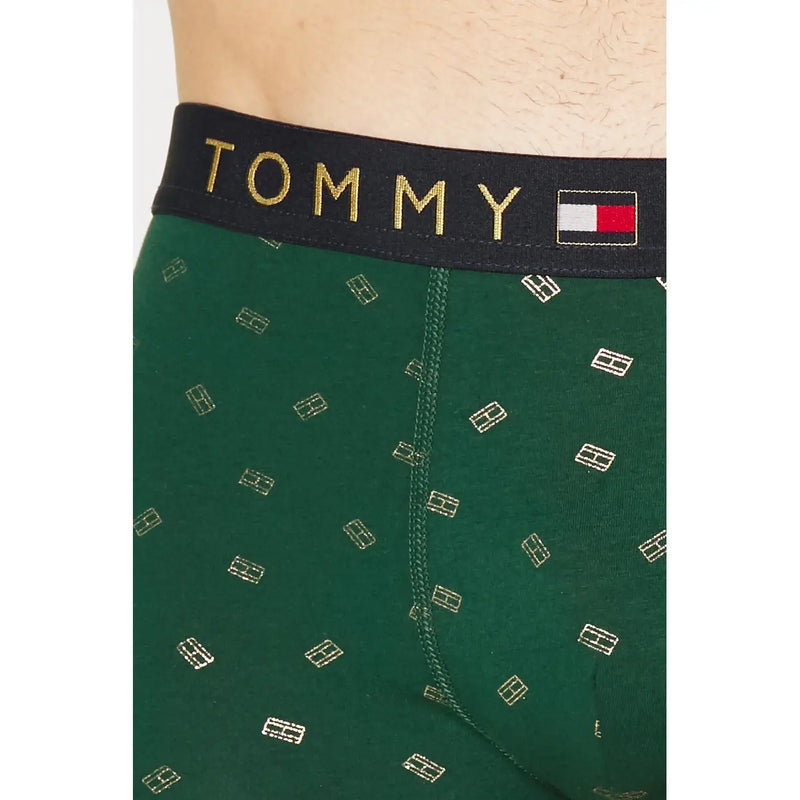 Dark green tommy hilfiger men cotton boxer briefs with gold logo pattern and black waistband with gold brand name