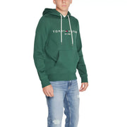 Tommy Hilfiger Sweat à capuche vert en coton pour homme, avec cordons de serrage blancs et poche avant.