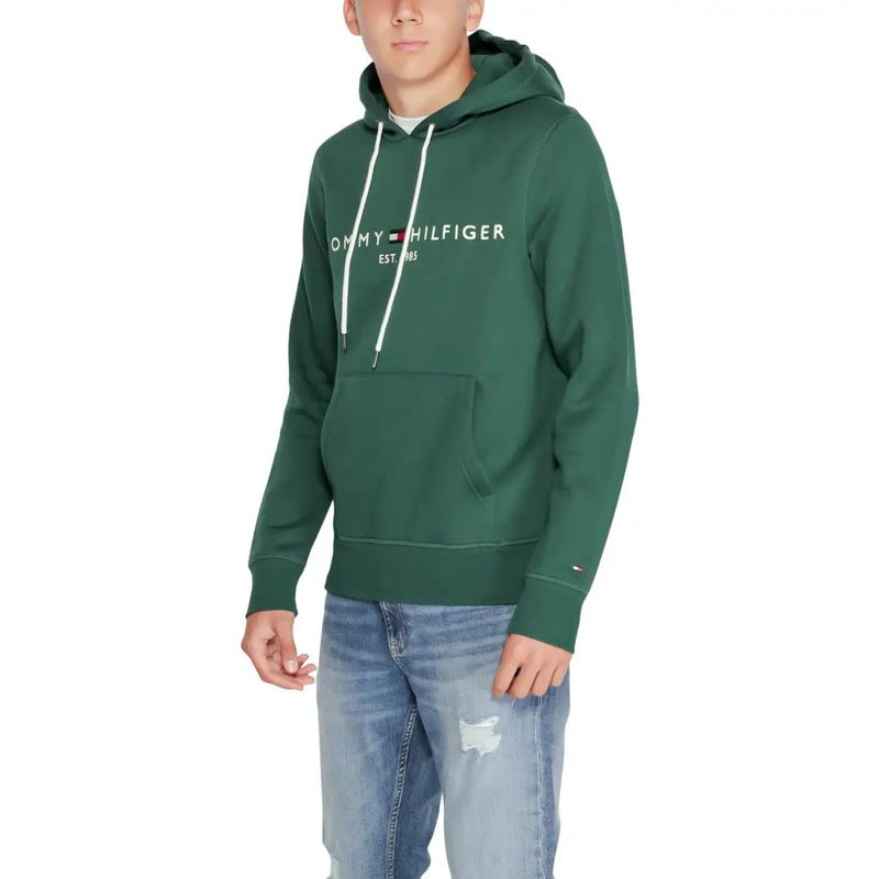 Tommy Hilfiger Sweat à capuche vert en coton pour homme, avec cordons de serrage blancs et poche avant.