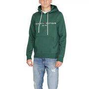 Tommy Hilfiger Sweat à capuche vert foncé en coton pour homme, avec cordons de serrage blancs et poche avant.