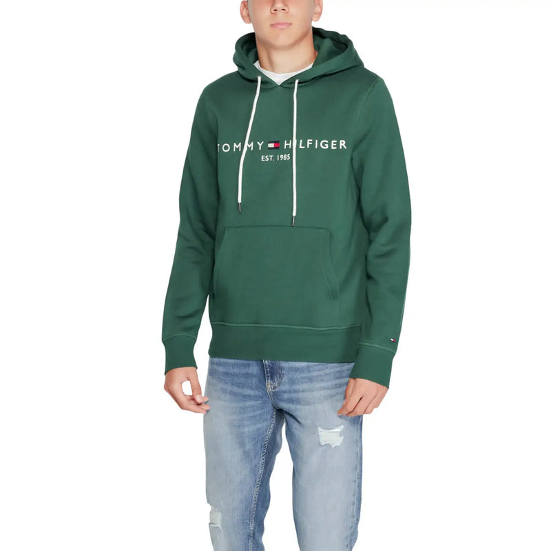 Tommy Hilfiger Sweat à capuche vert foncé en coton pour homme, avec cordons de serrage blancs et poche avant.