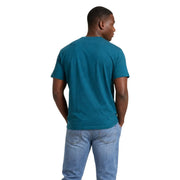 Une couleur turquoise Tommy Hilfiger T-shirt à manches courtes et col rond en coton biologique vert pour homme