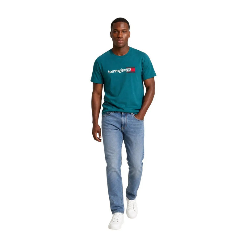 Tommy Hilfiger T-shirt homme en coton bio vert, avec logo blanc et rouge sur la poitrine, de couleur turquoise.