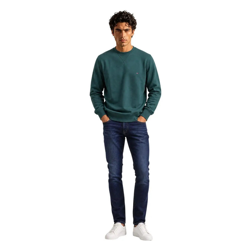 Tommy Hilfiger Sweat-shirt homme vert en molleton de coton, col rond, avec petit logo brodé sur la poitrine gauche.