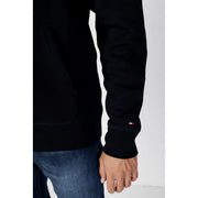 Tommy Hilfiger Sweat à capuche pour homme en coton noir avec un petit logo rouge, blanc et bleu sur le poignet