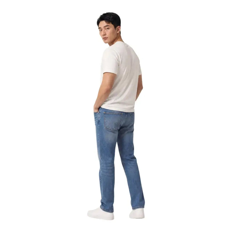 Tommy Hilfiger Jean homme bleu slim fit en coton biologique, coupe classique et délavage subtil