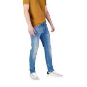 Jean slim en denim bleu délavé avec poches simples à l'avant et à l'arrière, de la marque Tommy Hilfiger Homme.