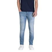 Tommy Hilfiger Jean slim bleu clair pour homme, en coton biologique stretch avec un délavage subtil.