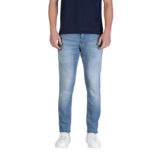 Tommy Hilfiger Jean homme bleu clair en coton biologique stretch, coupe slim, denim délavé clair avec un léger effet de décoloration