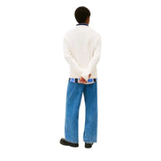Tommy Hilfiger Pull homme beige en maille, col rond, en coton bio, avec col bleu marine et ourlet rayé