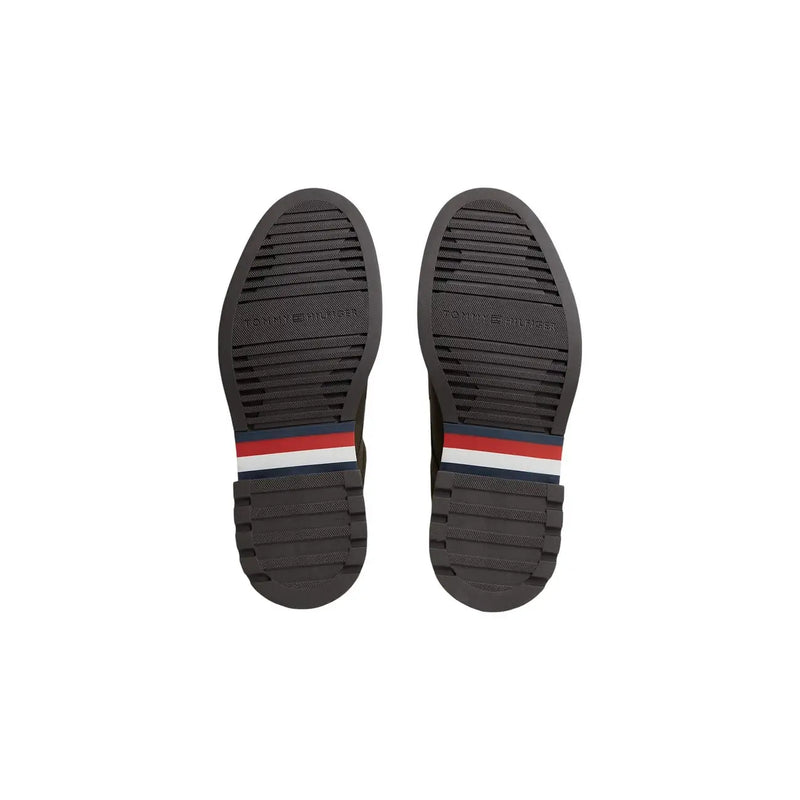 Mocassins verts en cuir Tommy Hilfiger pour homme, semelles en caoutchouc noir et rayures rouges, blanches et bleues à l'arrière.