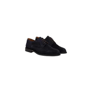 Chaussures habillées en daim noir à lacets, avec lacets foncés et petit talon, de Tommy Hilfiger collection de mocassins en cuir blanc pour hommes