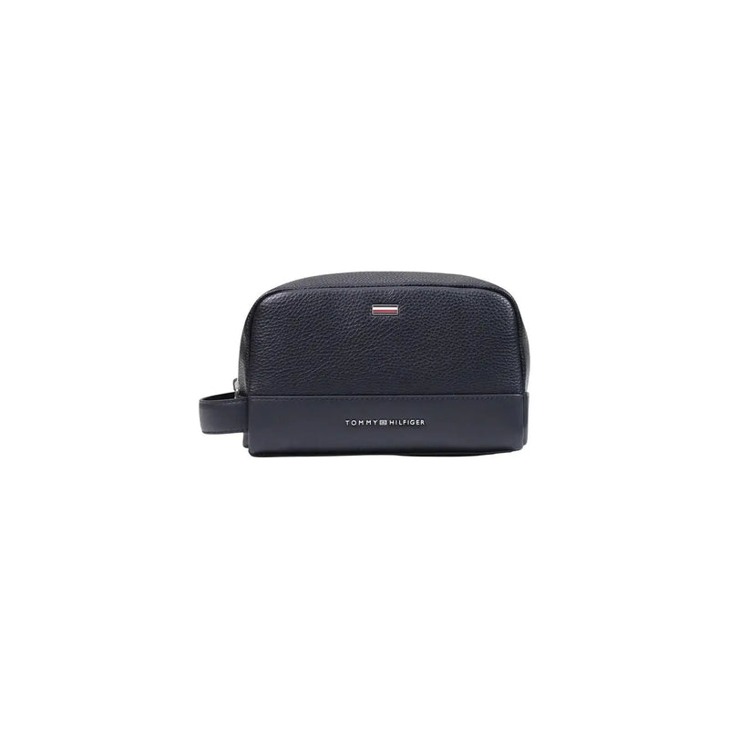 Trousse de toilette Tommy Hilfiger pour homme, en cuir texturé bleu marine foncé, avec logo métallique discret et poche zippée, petit format.
