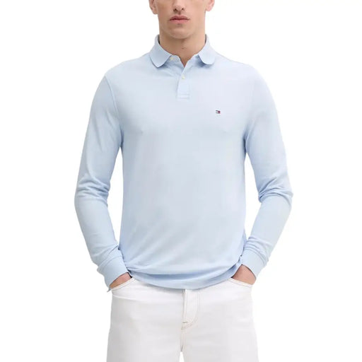 Tommy hilfiger light blue long-sleeve polo shirt with a small logo on the chest.