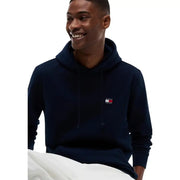 Sweat à capuche Tommy Hilfiger bleu marine pour homme, en coton bio, avec petit logo brodé sur la poitrine.