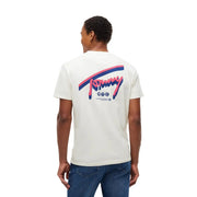 Tommy Hilfiger T-shirt blanc en coton bio pour homme avec logo graphique rétro Tommy NYC rose et marine.