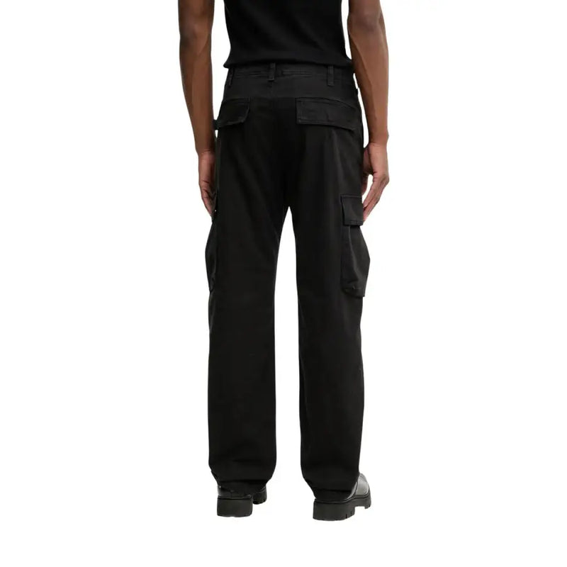 Pantalon cargo en coton lycra noir de Tommy Hilfiger vêtements pour hommes avec de multiples poches et une coupe décontractée vue de face