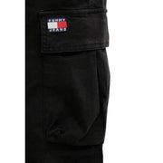 Tommy Hilfiger Jean Otis pour homme en toile de coton lycra noir, avec pantalon cargo en denim noir et écusson logo Tommy Jeans.
