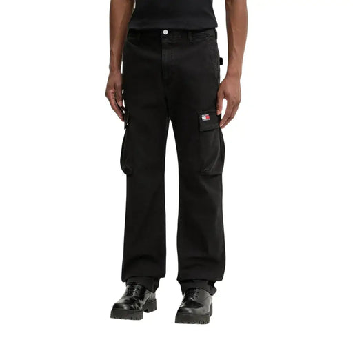 Tommy Hilfiger Pantalon cargo Otis Canvas pour homme, en coton noir et lycra, avec de multiples poches et un écusson logo sur la cuisse.