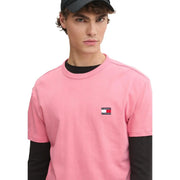 Tommy Hilfiger T-shirt rose en coton biologique pour homme, coupe classique, manches longues noires et petit logo sur la poitrine.