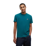 Pull ras du cou Tommy Hilfiger turquoise t-shirt avec un petit logo brodé sur la poitrine gauche, confectionné en coton biologique, coupe classique
