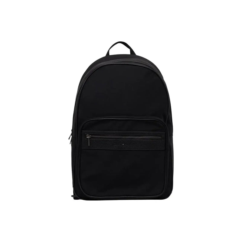 Sac à dos Tommy Hilfiger Repreve pour homme, noir, au design minimaliste et élégant, avec un logo discret sur la tirette de la fermeture éclair avant.