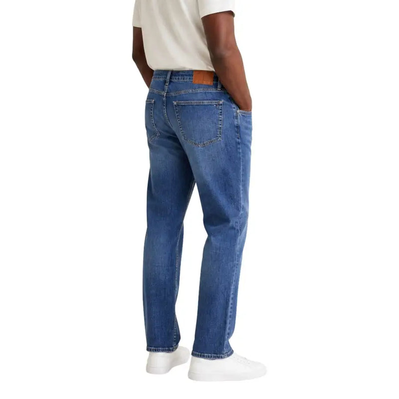 Tommy Hilfiger Jean Ryan slim droit pour homme, en denim bleu classique à cinq poches et empiècement en cuir marron