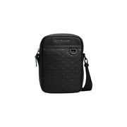 Sac bandoulière Tommy Hilfiger pour homme, noir, en polyuréthane tissé texturé, au design minimaliste et élégant.